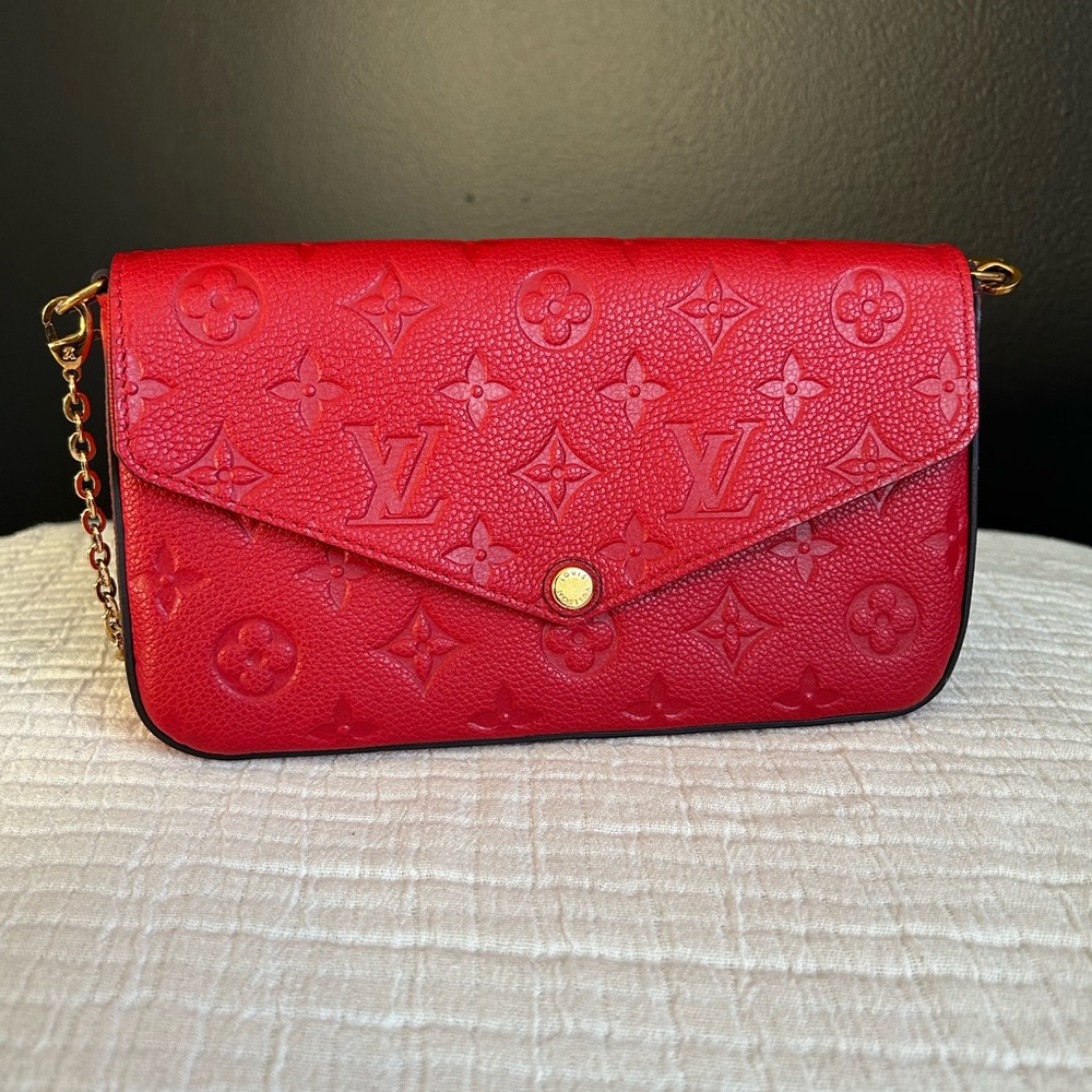 Félicie Pochette, monogram leather comes with zipped pocket, removable strap